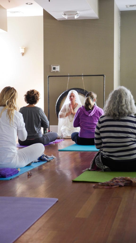Teacher HariPrakaash led a yoga class during the 2015 O+ Festival in Kingston. Photo by Project E.J. Photography.